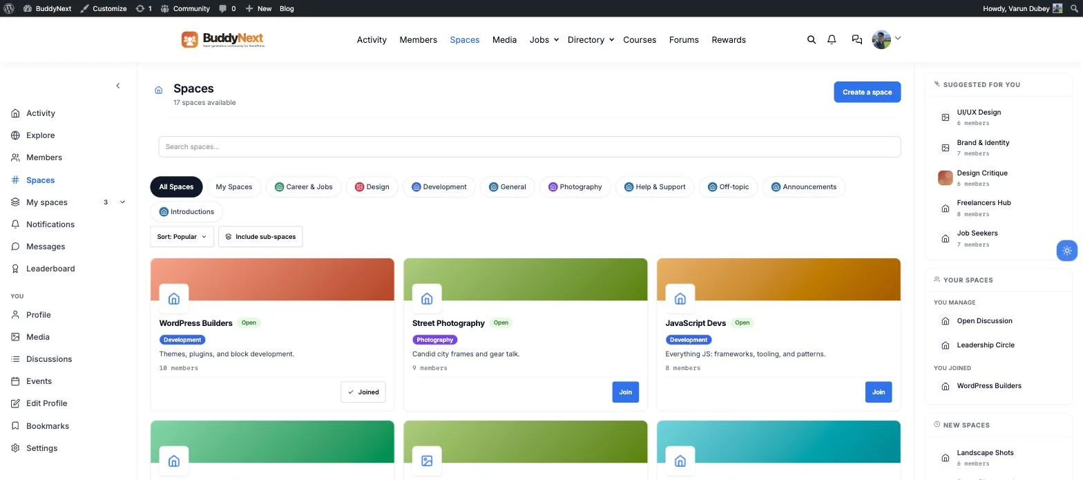 BuddyNext spaces directory showing topic-based community spaces with member counts and join buttons